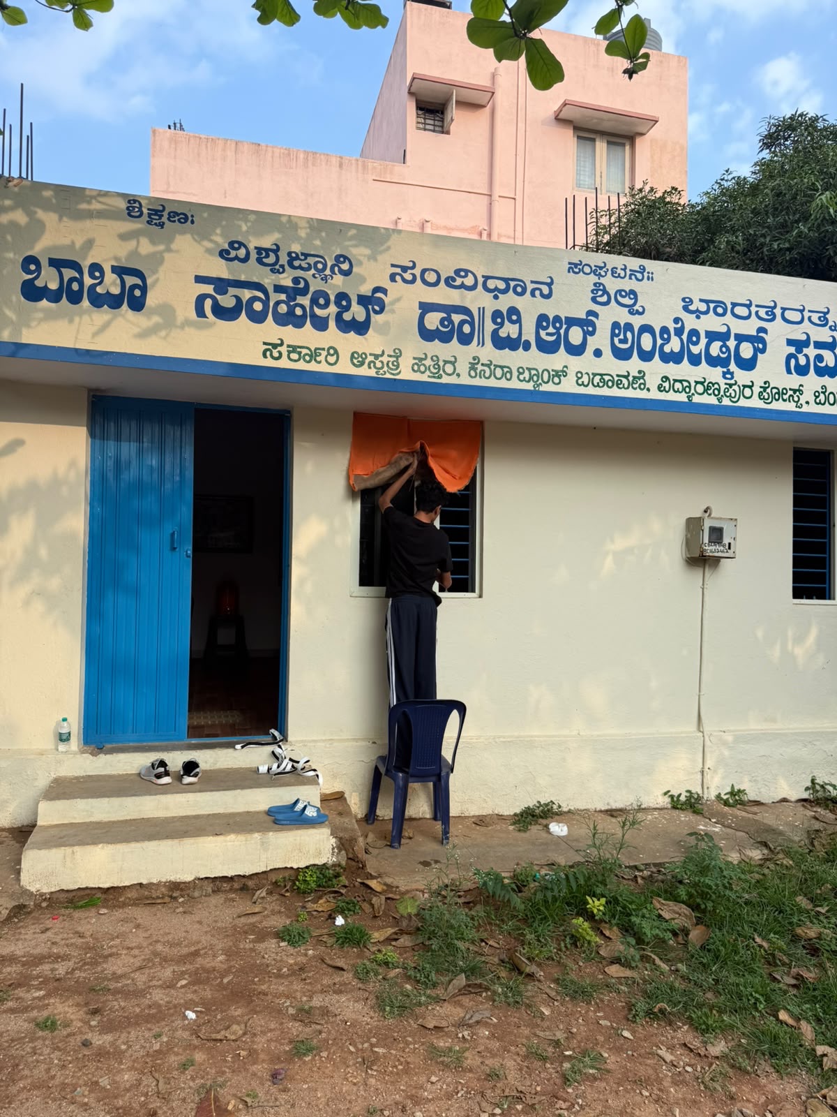 Project PureVayu installing an air filter at a community hall
